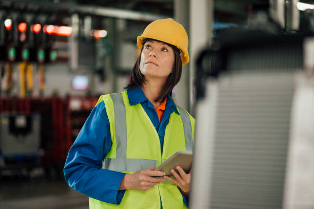 istock Female Factory Surveyor 892871748