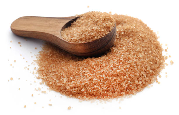 istock Brown sugar with wooden scoop 892873032