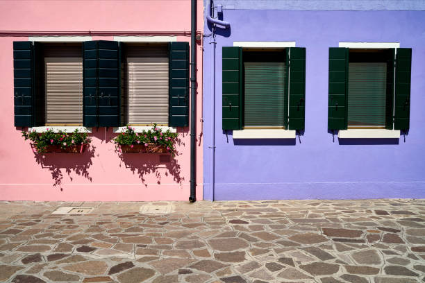 istock Window with opened green shutter. Italy, Venice, Burano island. 892876136