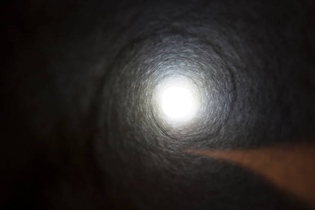 istock Light at end of tunnel 892879728