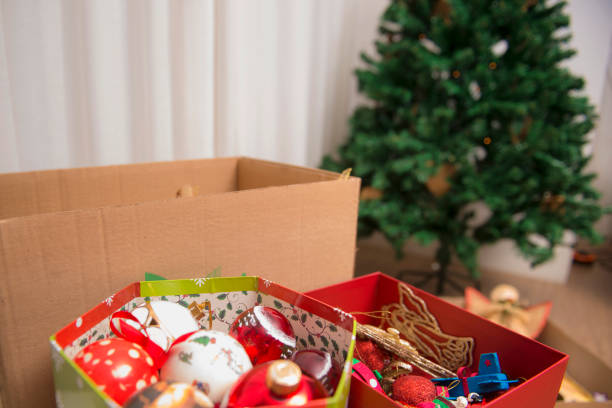 istock Tidying up the christmas tree 892883252