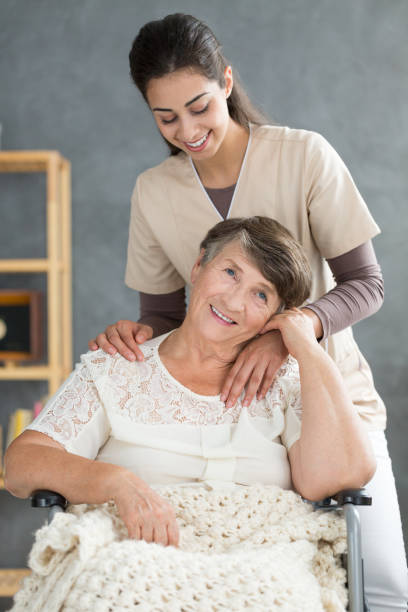 istock Smiling elderly woman and daughter 892893794