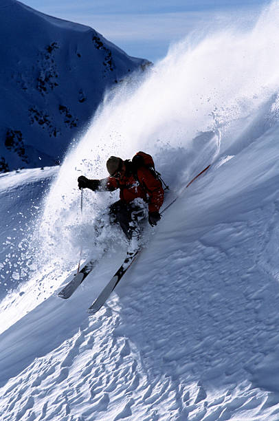 Riding the Wave  extreme skiing stock pictures, royalty-free photos & images