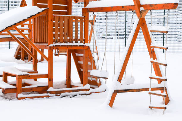 istock Children's playground covered with snow. 892910842
