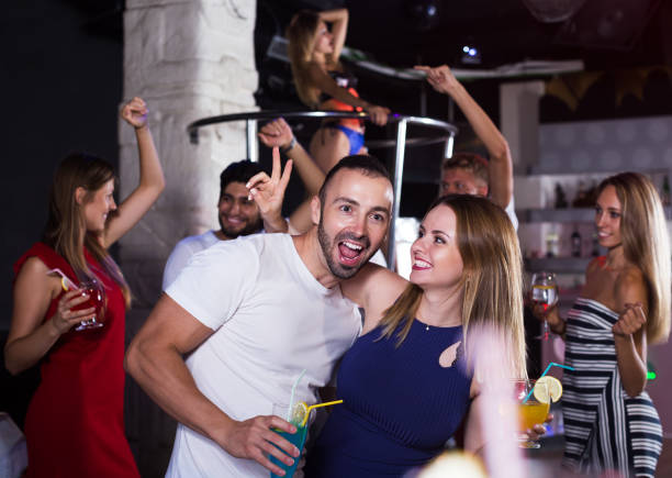 istock People in night club 892929432