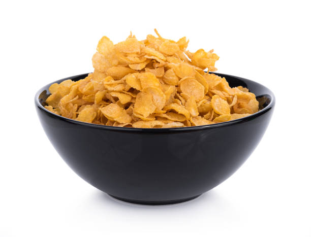 istock Corn flakes with milk in bowl isolated 892929706