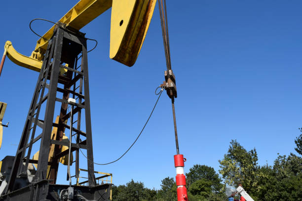 istock Pumping unit as the oil pump installed on a well 892948244