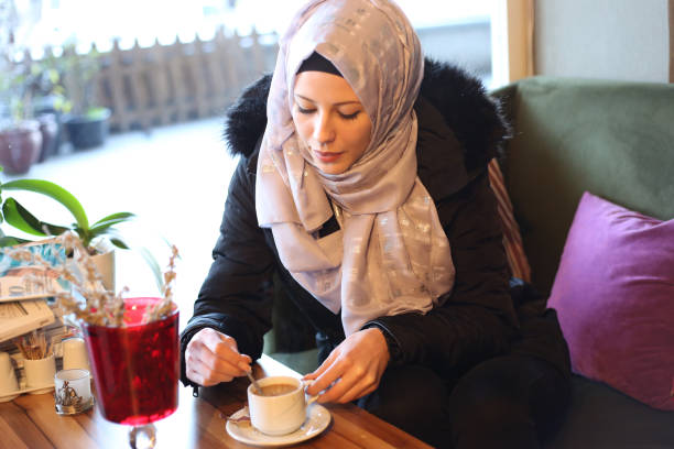 istock Young muslim women in cafetaria 892959346