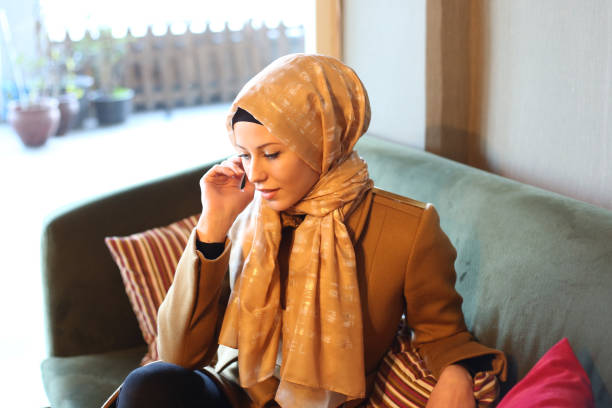 istock Young muslim women in cafetaria 892968584