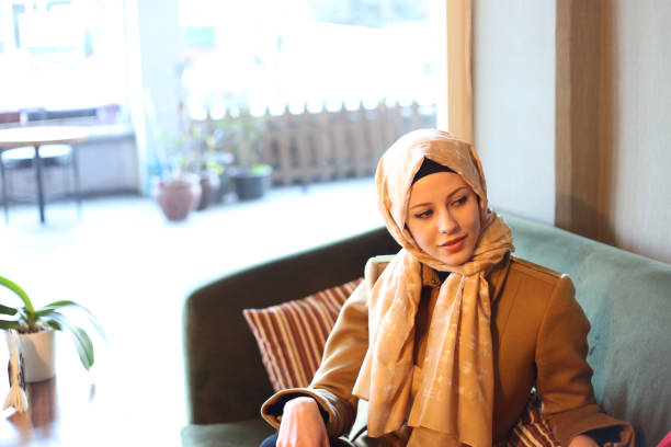 istock Young muslim women in cafetaria 892968668