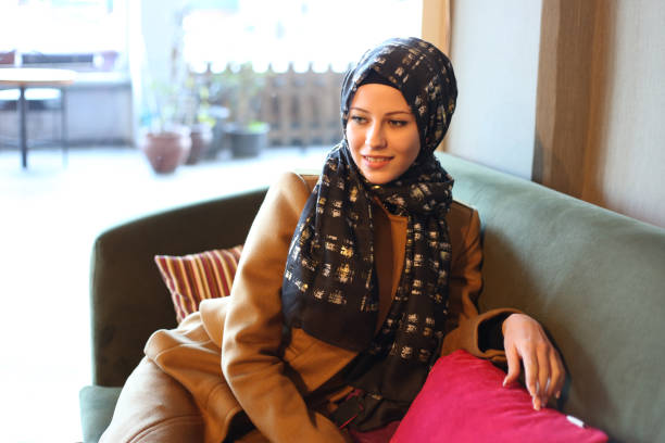istock Young muslim women in cafetaria 892970930