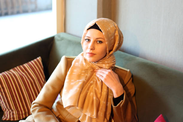 istock Young muslim women in cafetaria 892973218
