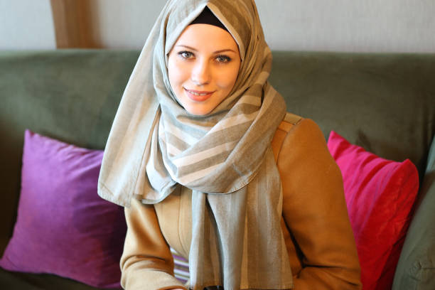 istock Young muslim women in cafetaria 892973806