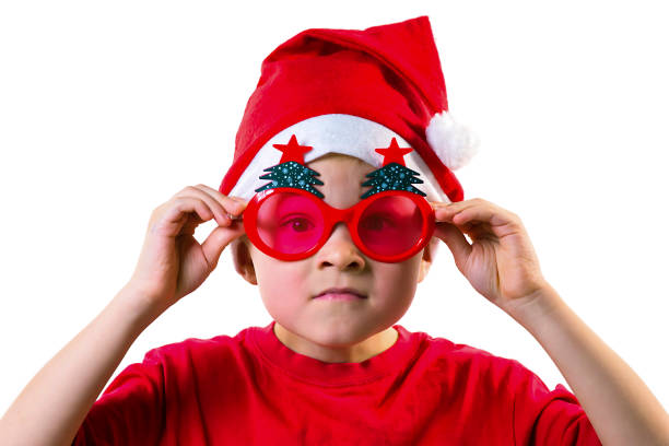 istock boy Santa Claus showing emotions on a white background 892974208