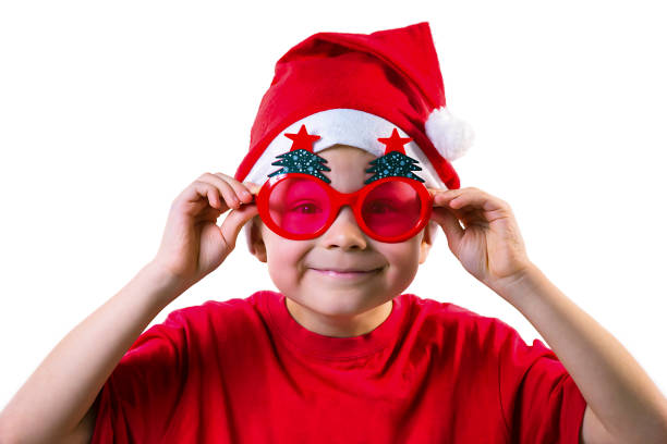 istock boy Santa Claus showing emotions on a white background 892978570