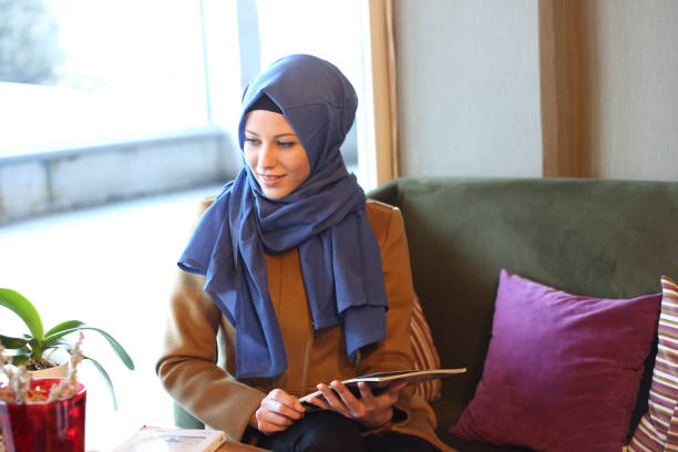 istock Young muslim women in cafetaria 892978728