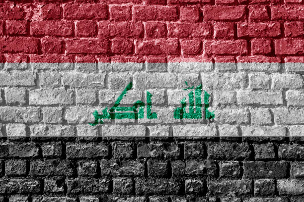 istock Iraq Flag Painted on brick wall 892988484