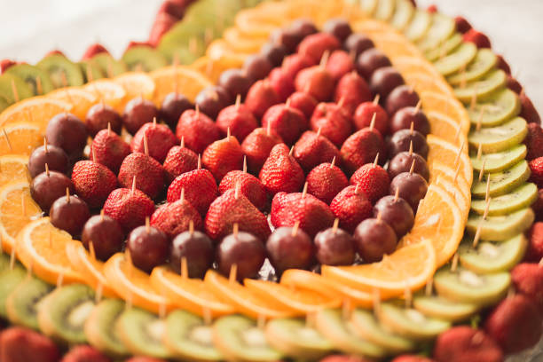 Authentic buffet, assorted fresh fruits, berries and citrus. Preparation for design creative menu