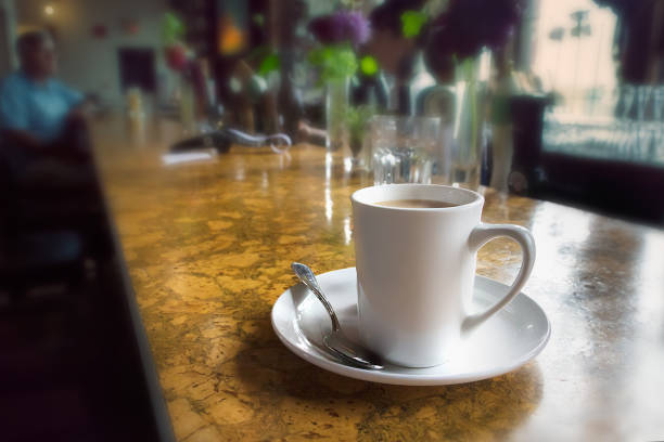 istock A mug of coffee on a counter bar table. 893006296