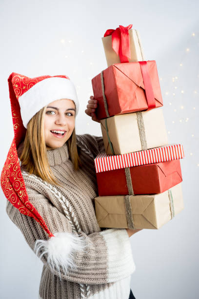 istock Girl wearing christmas cap 893016472