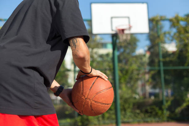 istock Basketball player training on the court 893016492