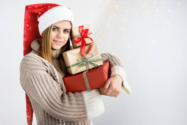 istock Girl wearing christmas cap 893021054