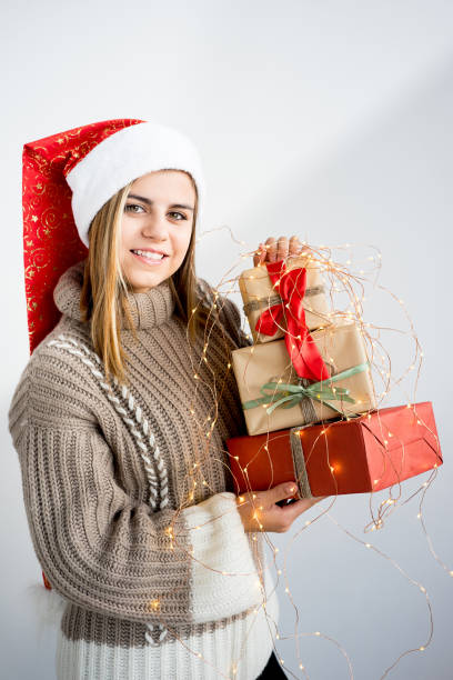 istock Girl wearing christmas cap 893021362