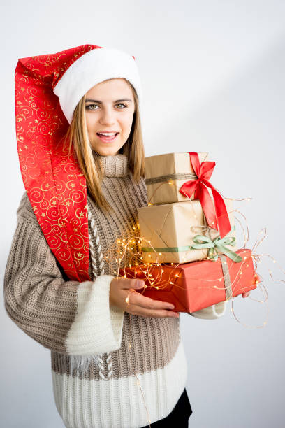 istock Girl wearing christmas cap 893021640