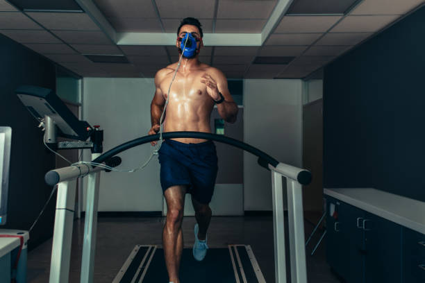 istock Athlete examining his performance in sports science lab 893033080