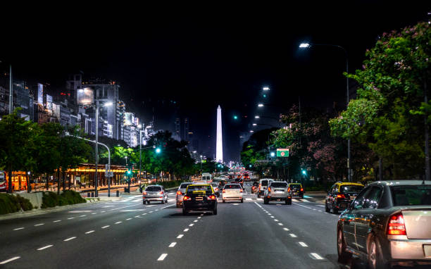 Night traffic on 9 de July Avenue, downtown, Obelisco, Buenos Aires, Argentina