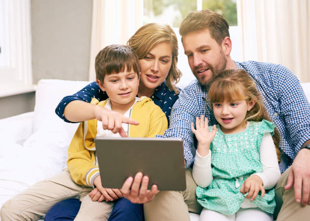 istock Learning new apps together as a family 893048986