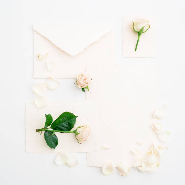 istock Flowers and paper cards. Flat lay, Top view 893058424