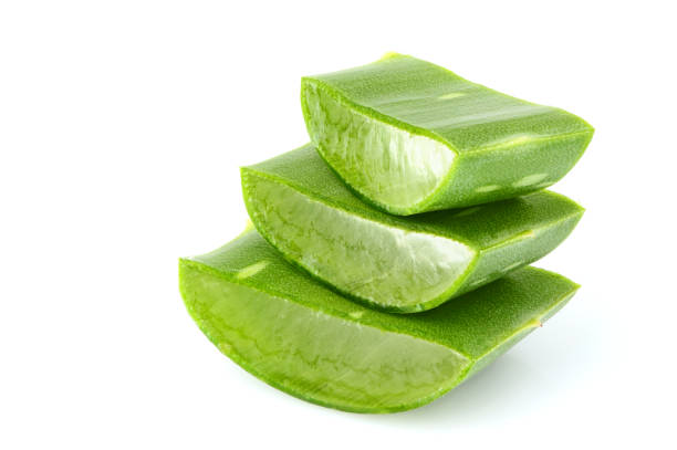 istock Chopped leaf aloe vera close-up isolated. 893098584