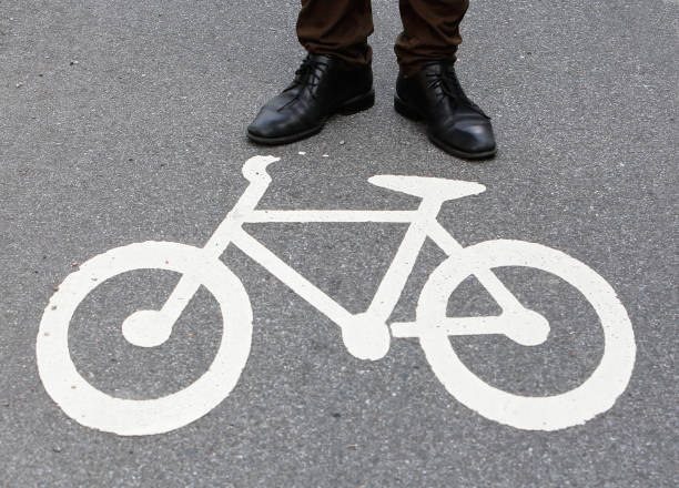 istock Person on bike lane 893098852