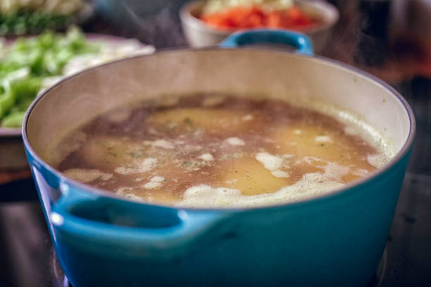 istock Preparing Delicious Minestrone Soup with Fresh Vegetables 893098876