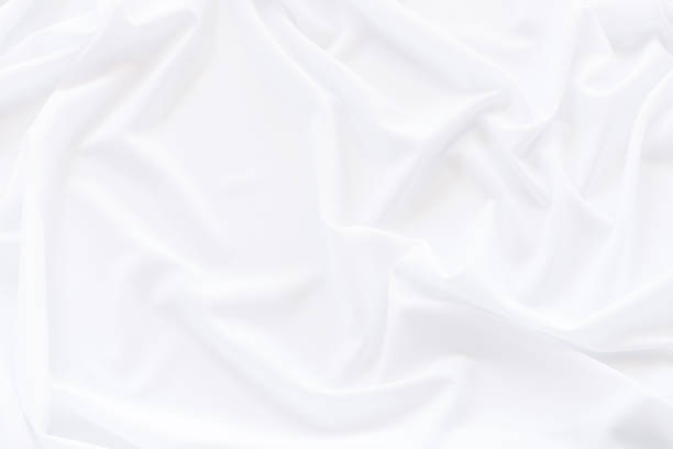 istock White cloth background and texture, Crumpled of white fabric abstract 893104964