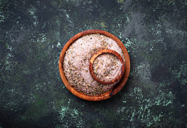 istock Himalayan salt with dried herbs. Aromatic spices 893107486