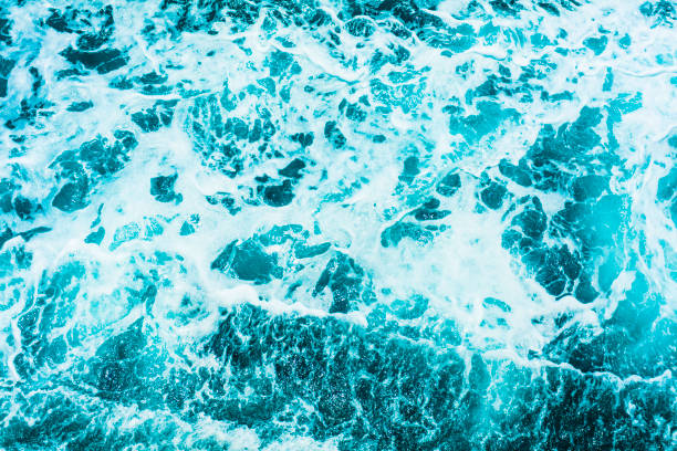 istock Sun reflections in sea water from above 893112156