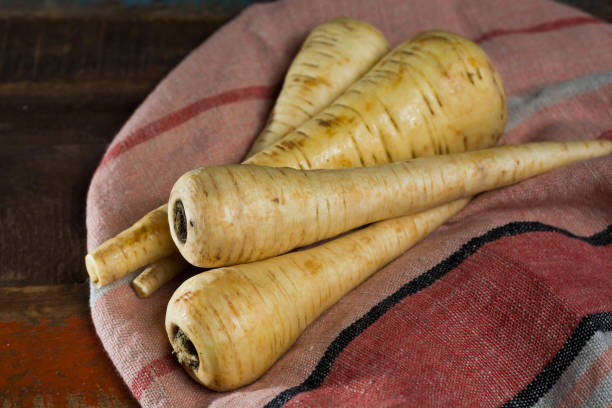 istock Uncooked parsnip roots new harvest 893115660