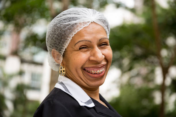 istock Happy Brazilian female maid 893141394