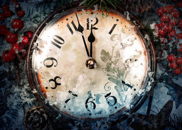 Clock covered with snow. Christmas Eve and New Years at midnight.