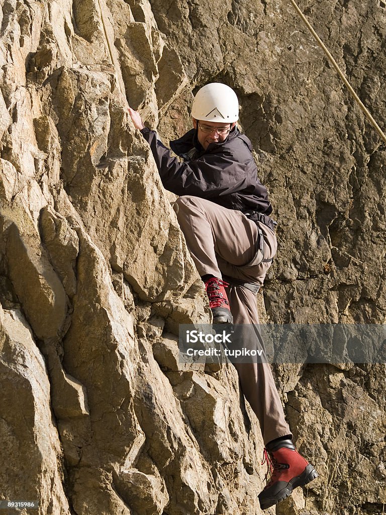 Alpinista swarming up - Foto de stock de Adulto royalty-free