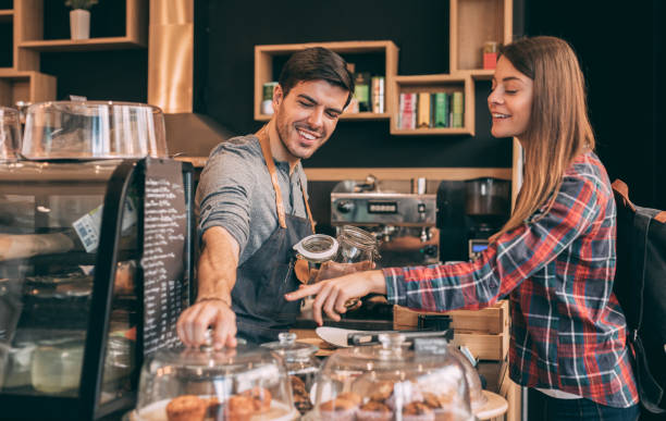istock Woman buying cookies 893160684
