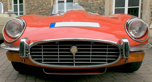 istock Front part of old red vintage convertible 89317709