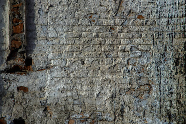 istock Old brick wall texture. Grunge background of aged stone surface 893183388