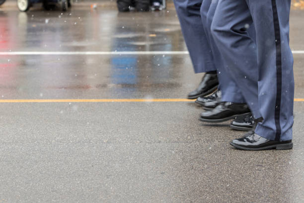 istock A formation of uniformed military men in a parade 893186216