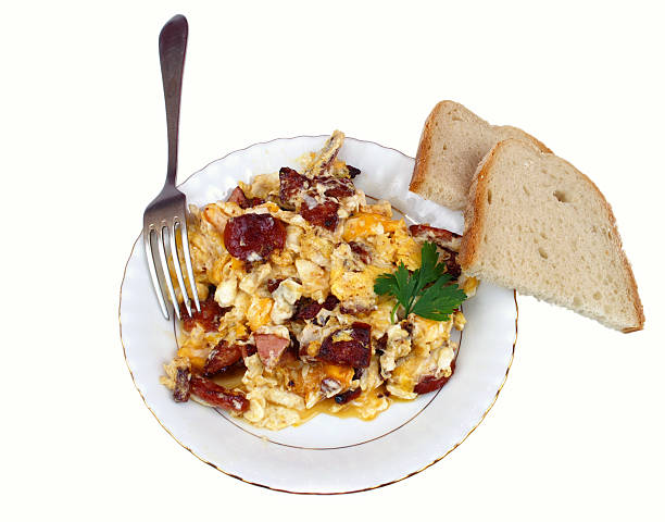 rührei - fork plate isolated scrambled eggs stock-fotos und bilder