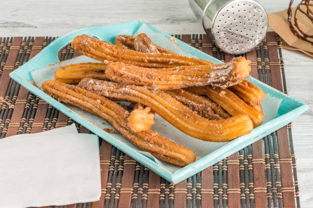 istock Traditional churros with hot chocolate 893212692