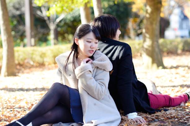 istock Young couple at a park 893215102