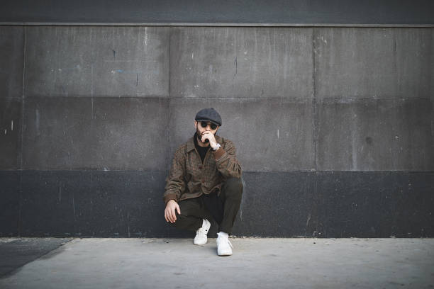 istock Portrait of young man on the wall 893215380